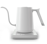 White Timemore electric pour-over kettle on its base